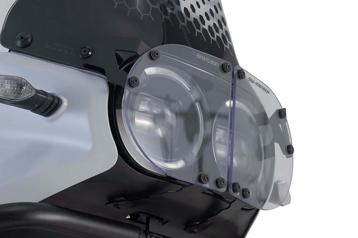 Protección de faros Soporte con embellecedor. Ducati DesertX (22-).