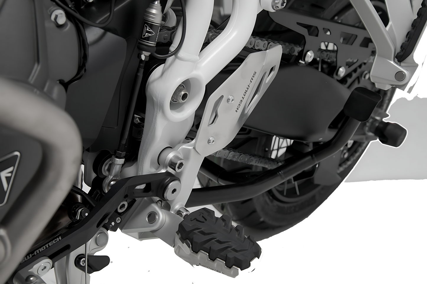 Protector de talón izquierdo Negro. Triumph Tiger 900/GT/Rally/Pro (19-23).