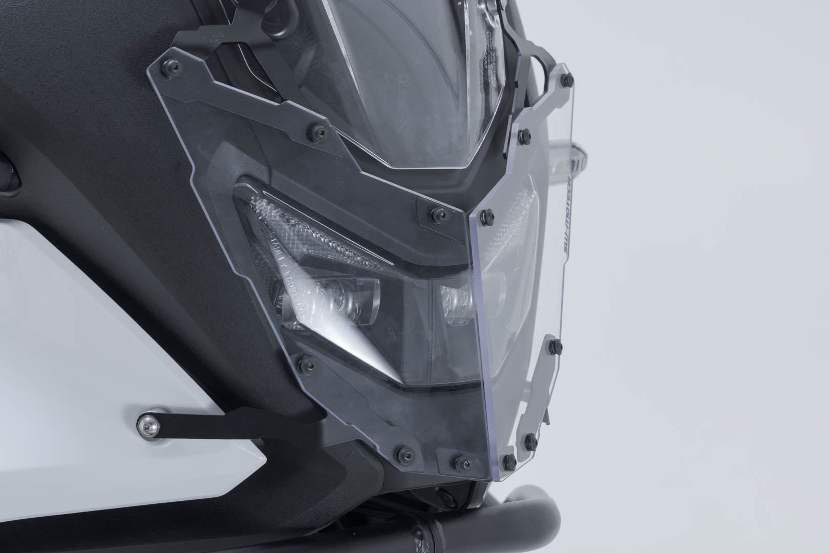 SW-MOTECH Protección de faros Soporte con embellecedor. XL750 Transalp (24-).