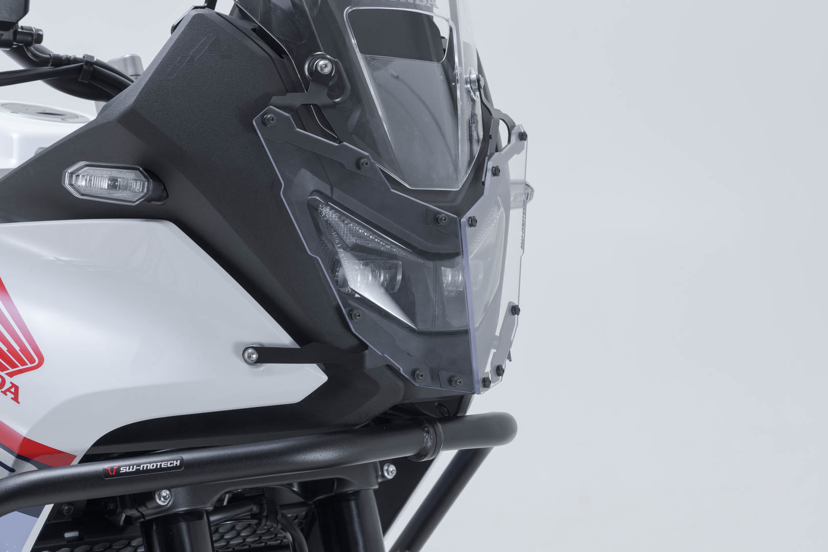 SW-MOTECH Protección de faros Soporte con embellecedor. XL750 Transalp (24-).