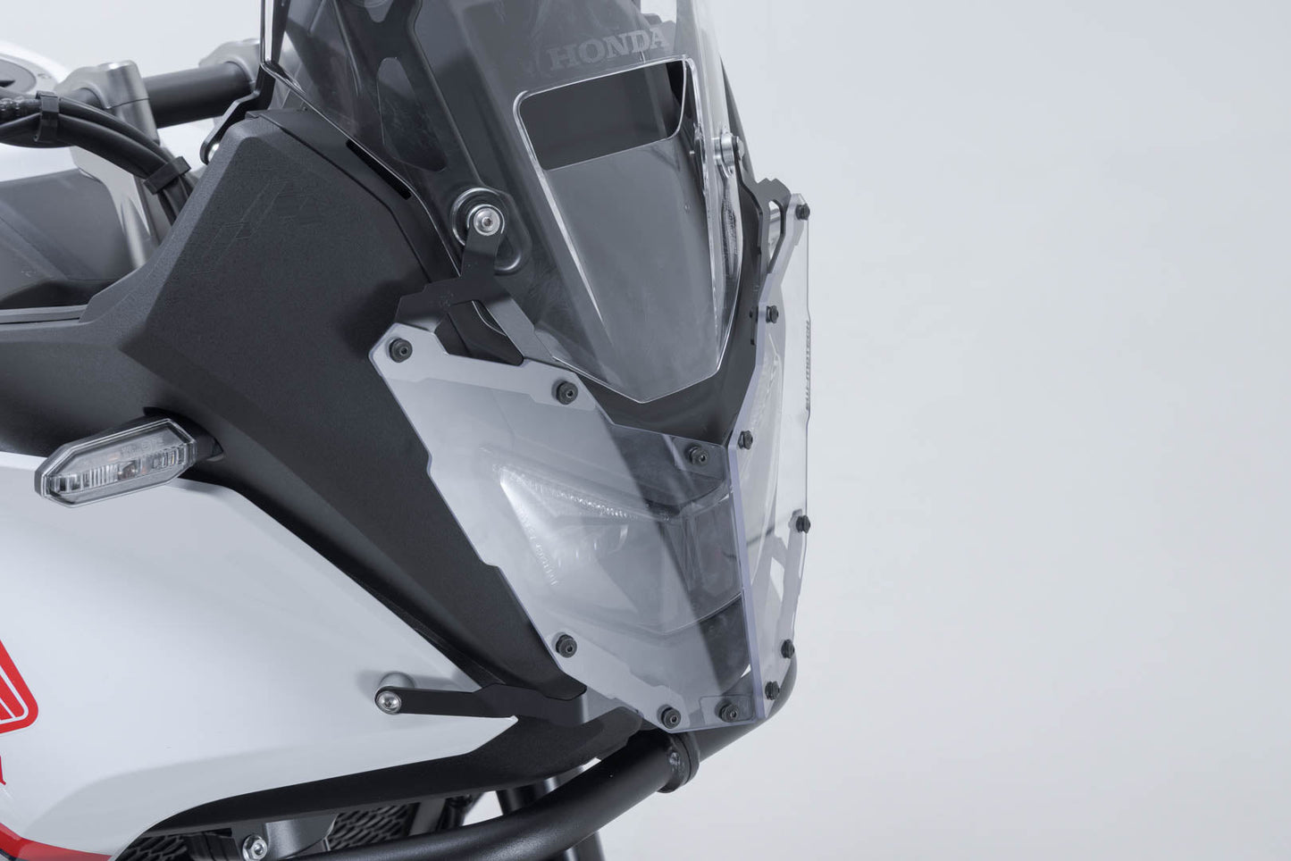 SW-MOTECH Protección de faros Soporte con embellecedor. XL750 Transalp (24-).