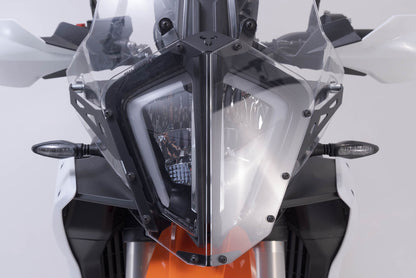 SW-MOTECH Protección de faros Soporte con embellecedor. KTM 890 Adv. R (22-).