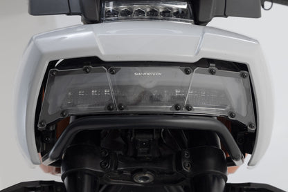 SW-MOTECH Protector de luces delanteras Soporte con panel de PVC. H-D Pan America (21-).