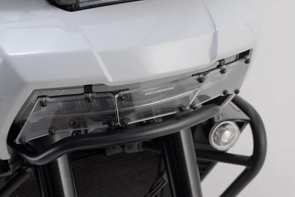 SW-MOTECH Protector de luces delanteras Soporte con panel de PVC. H-D Pan America (21-).