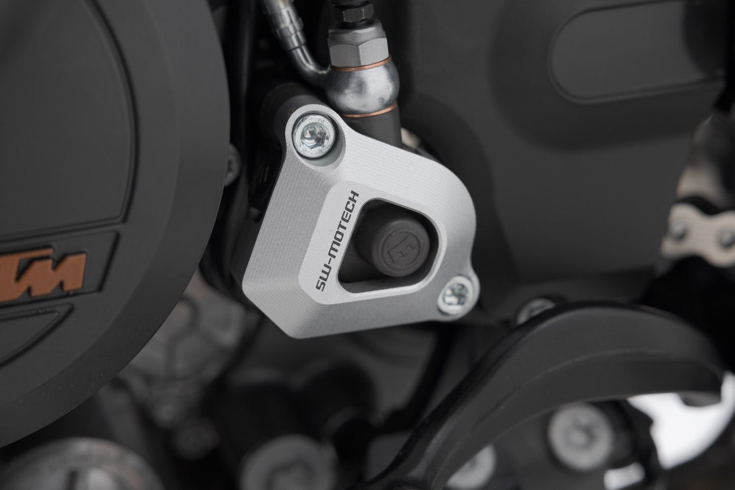 SW-MOTECH Protección para el cilindro receptor del embrague Plateado. Modelos KTM.
