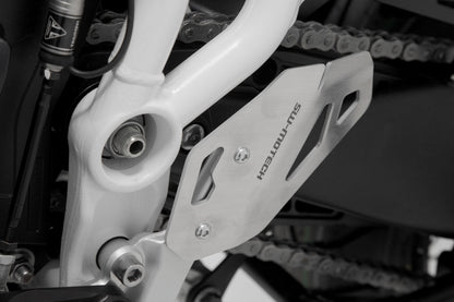 SW-MOTECH Protector de talón izquierdo Negro. Triumph Tiger 900/GT/Rally/Pro (19-23).