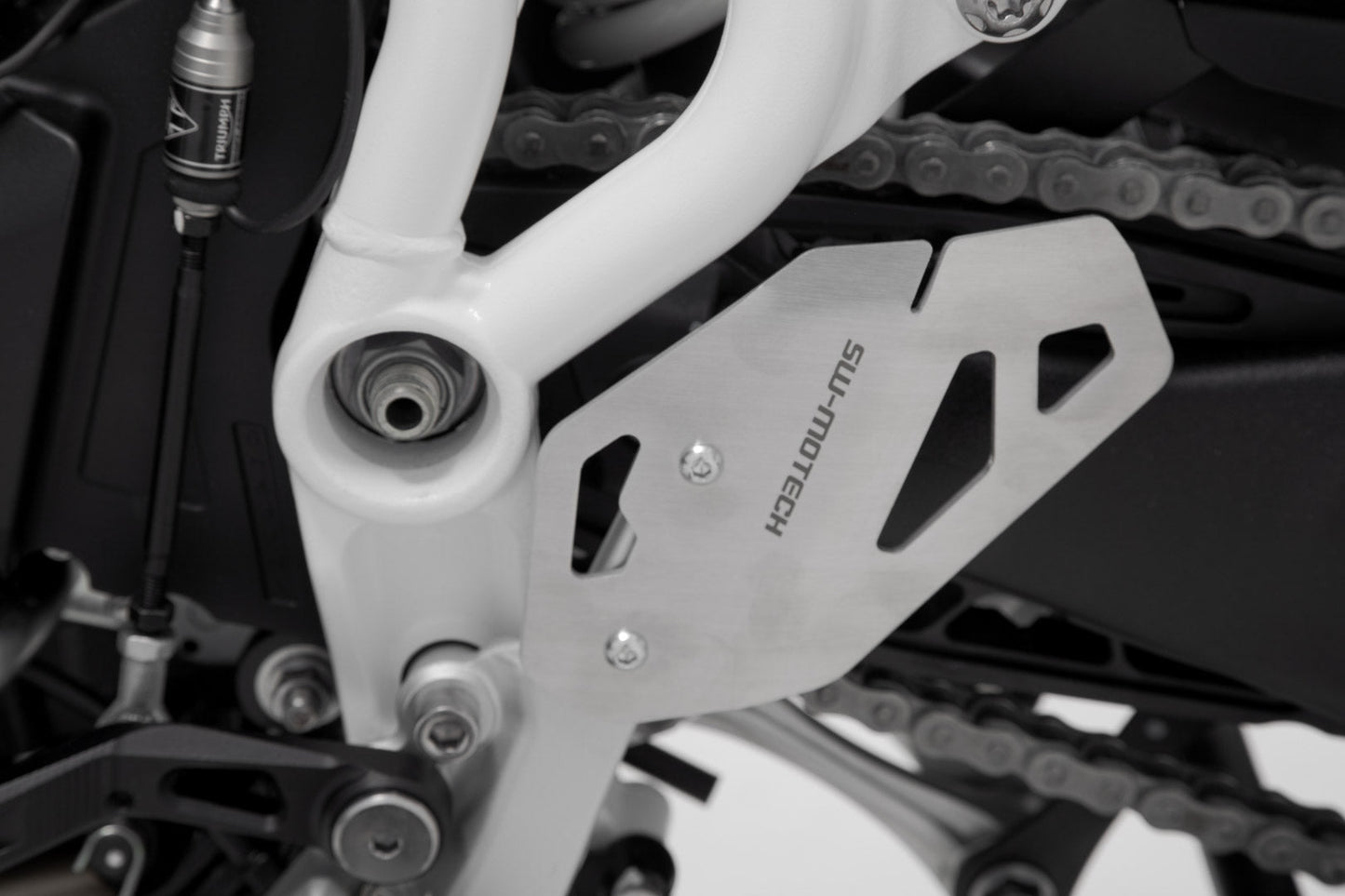 SW-MOTECH Protector de talón izquierdo Negro. Triumph Tiger 900/GT/Rally/Pro (19-23).
