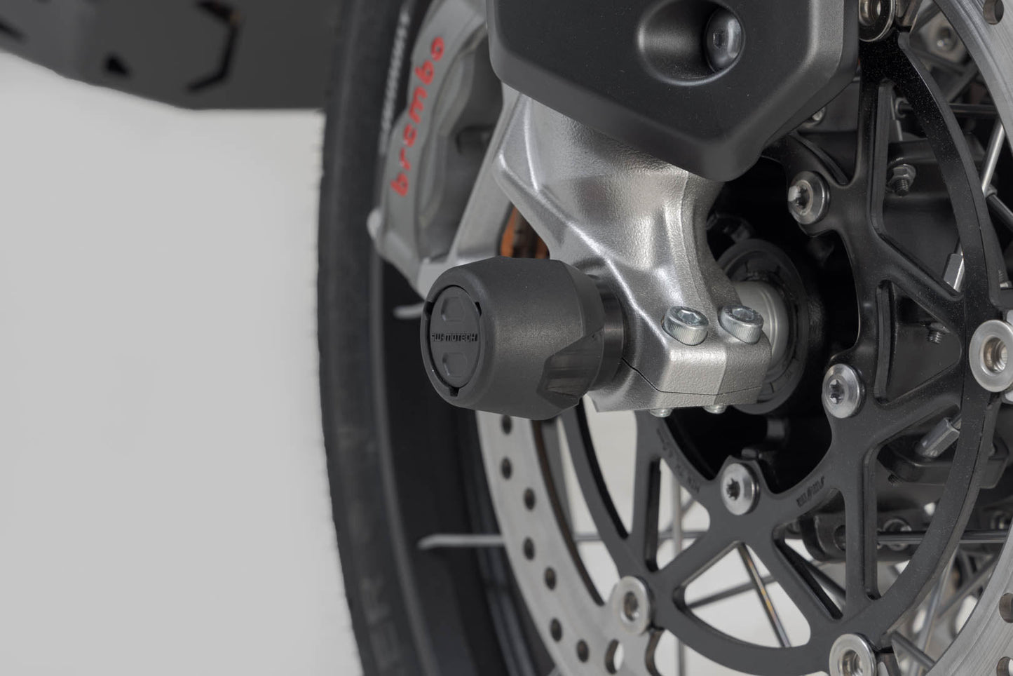 SW-MOTECH Kit de topes anticaidas para el eje trasero Negro. Modelos Suzuki Honda Triumph.