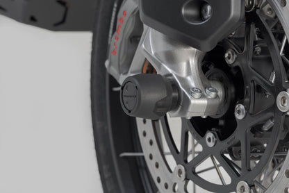 SW-MOTECH Kit de topes anticaidas para el eje trasero Negro. Modelos Suzuki Honda Triumph.
