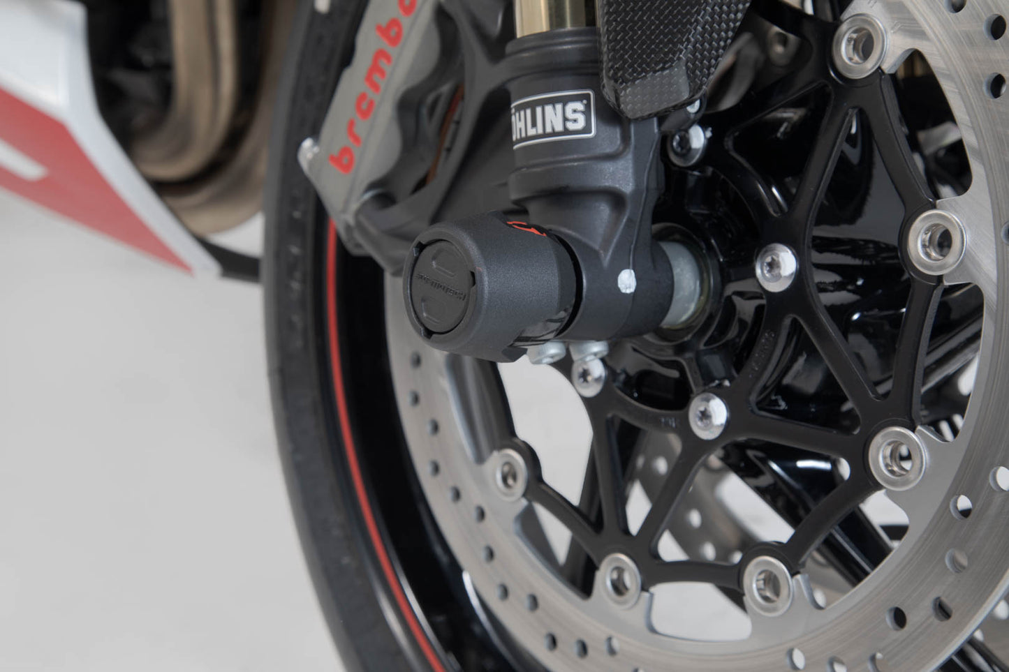 SW-MOTECH Kit de topes anticaidas para el eje delantero Negro. Modelos Triumph Yamaha Royal Enfield.