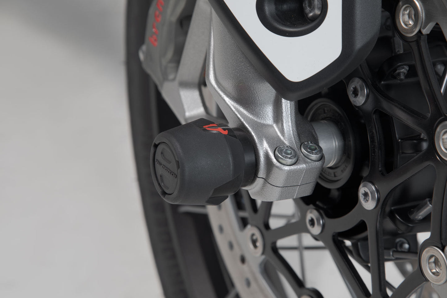 SW-MOTECH Kit de topes anticaidas para el eje delantero Negro. Modelos Triumph Honda Voge Yamaha.