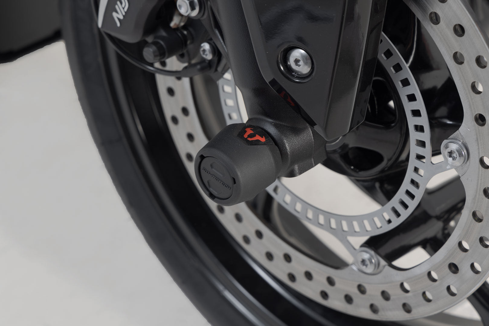 SW-MOTECH Kit de topes anticaidas para el eje delantero Negro. Modelos Triumph /Honda /Royal Enfield.