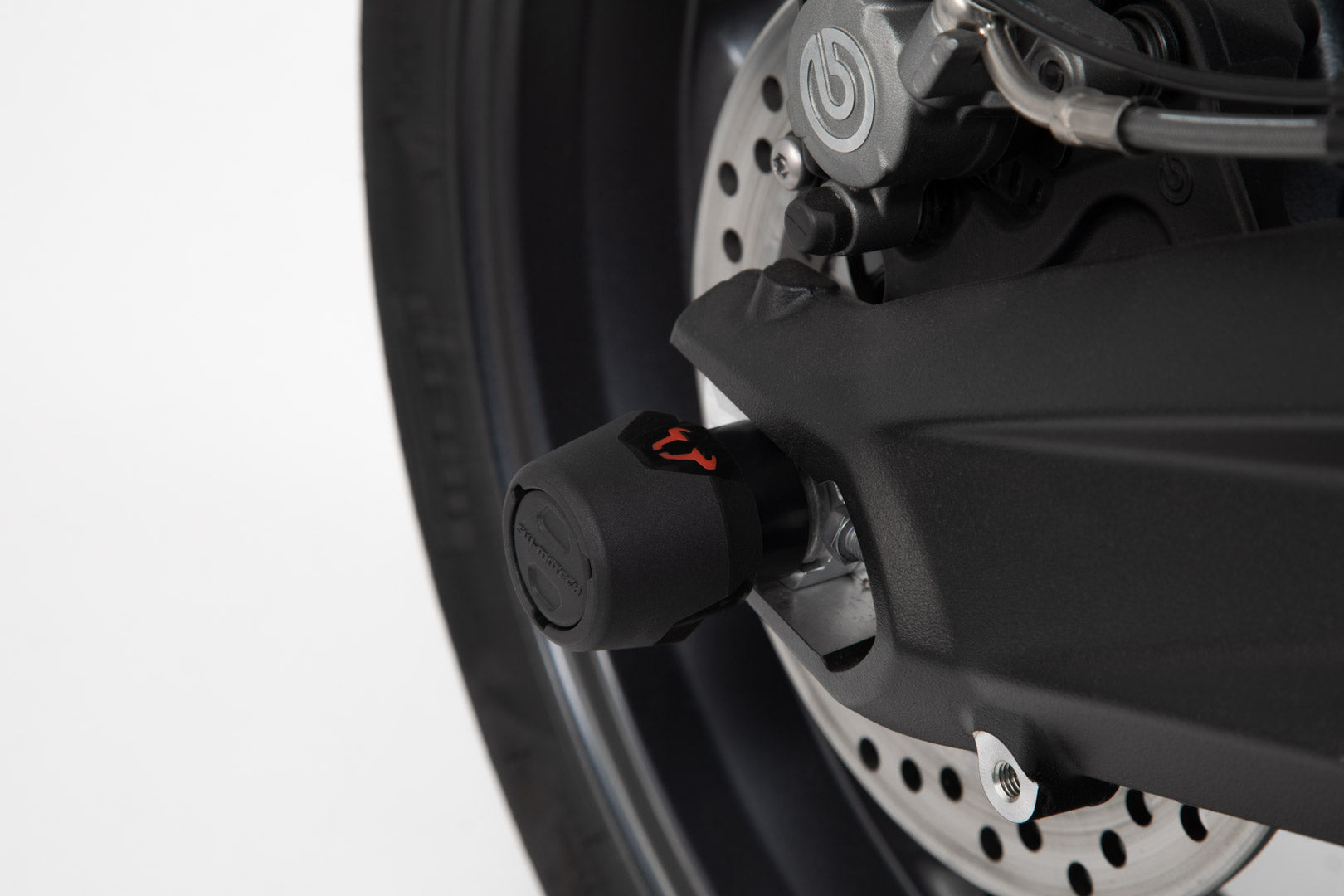 SW-MOTECH Kit de topes anticaidas para el eje trasero Negro. Street Triple (12-) Daytona (13-17).