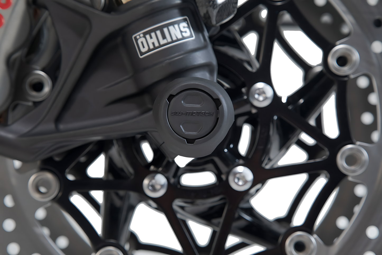 Kit de topes anticaidas para el eje delantero Negro. Modelos Tiger 800  / Speed Triple / Ténéré.